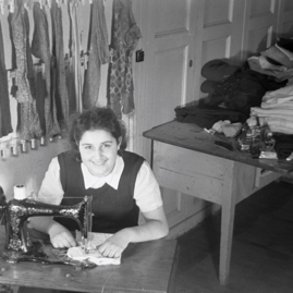 Girl using sewing machine.jpg
